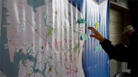 Resident identifying places on Norfolk map