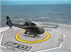 image of helicopter landing on cruise ship helo pad